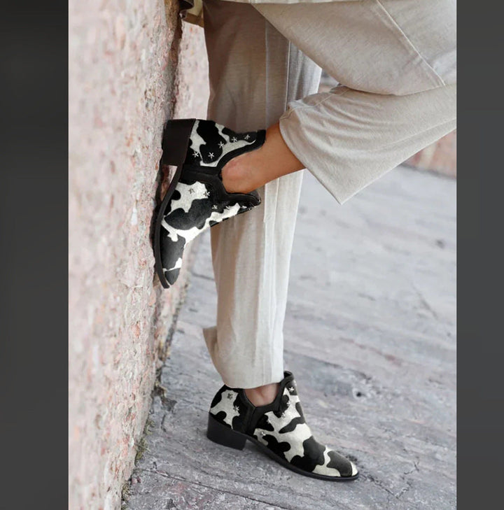 STIVALETTI WESTERN CON BORCHIE