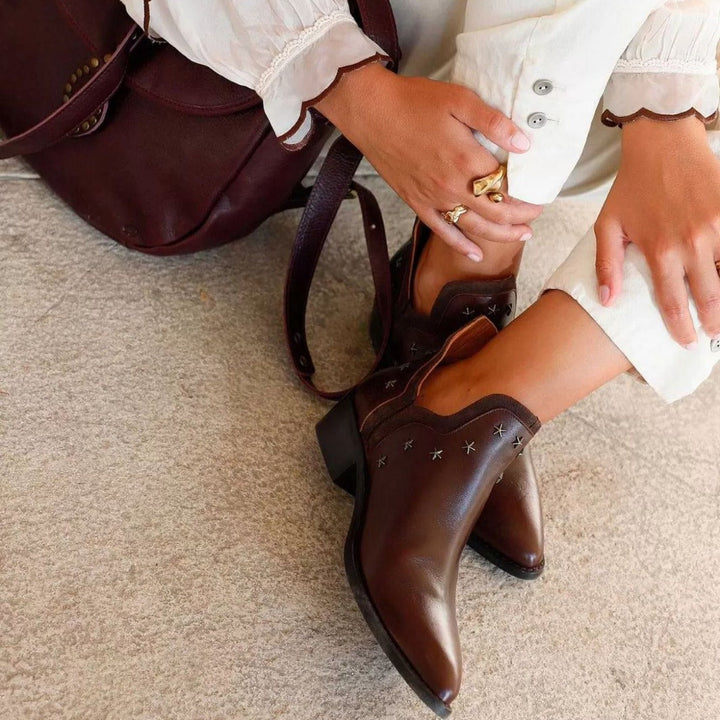 STIVALETTI WESTERN CON BORCHIE