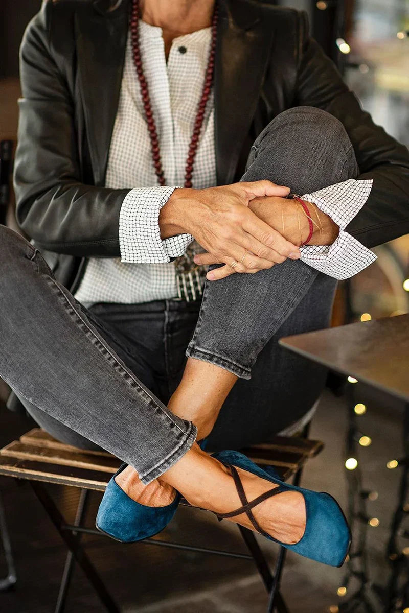 DÉCOLLETÉ CON CINTURINO INCROCIATO